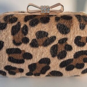 Elegant Leopard Print Clutch with Bow Detail